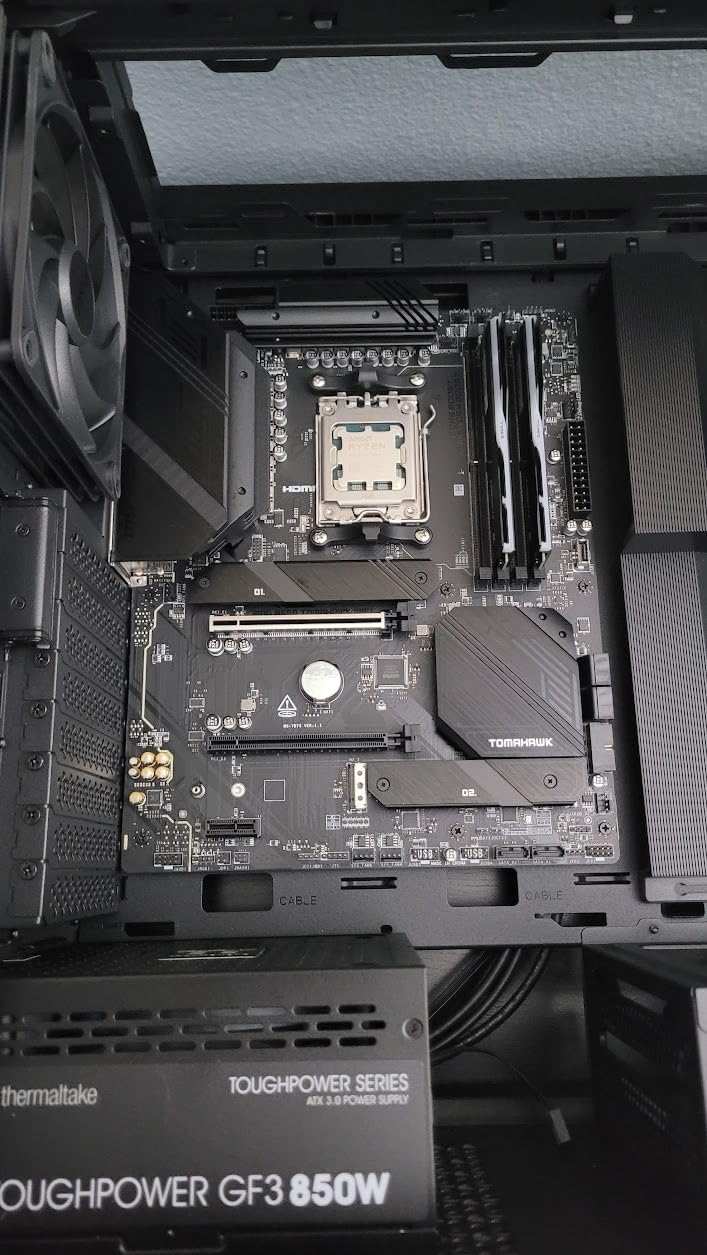 MSI MAG B650 Tomahawk WiFi Gaming Motherboard (AMD Ryzen 9000/8000/7000 Series Processors, AM5, DDR5, PCIe 4.0, M.2, SATA 6Gb/s, USB 3.2 Gen 2, HDMI/DP, Wi-Fi 6E, Bluetooth 5.3, 2.5Gbps LAN, ATX) Customer Review MSI MAG B650 Tomahawk WiFi Gaming Motherboard (AMD Ryzen 9000/8000/7000 Series Processors, AM5, DDR5, PCIe 4.0, M.2, SATA 6Gb/s, USB 3.2 Gen 2, HDMI/DP, Wi-Fi 6E, Bluetooth 5.3, 2.5Gbps LAN, ATX) - Customer Photo 3