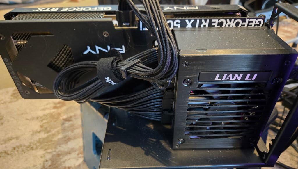 Lian Li SP V2 750 Watt SFX Form Factor Power Supply with Native 12V-2x6 Cable - Low Noise - 80+ Gold Efficiency - ATX 3.1 & PCIe 5.0 Compliant - 92mm FDB Fan - 10-Year Warranty - Black (SP750G.B) - Customer Photo 0