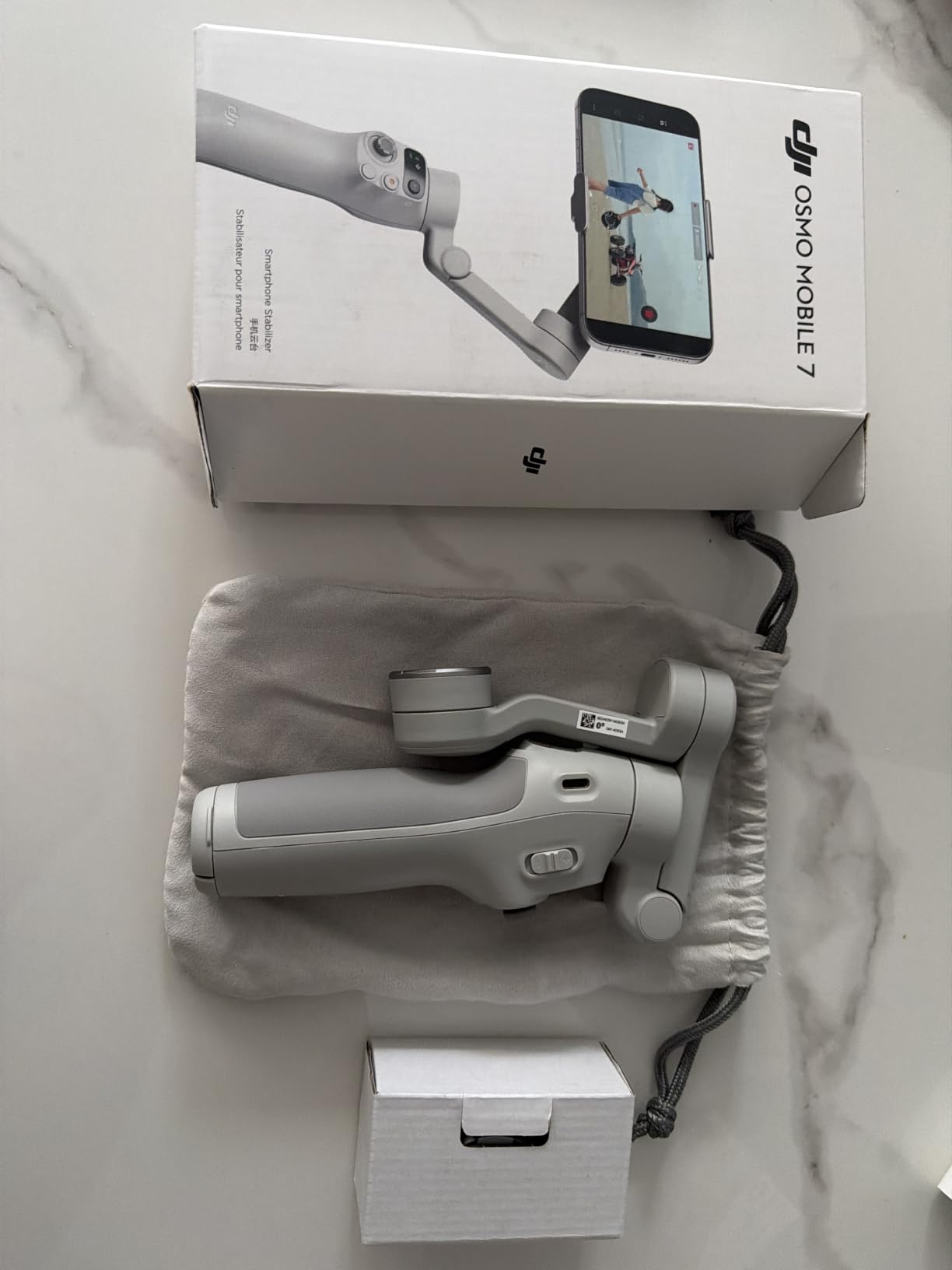 DJI Osmo Mobile 7 Gimbal Stabilizer for iPhone, Android, Built-in Tripod, Portable Stabilizer for iPhone, Selfie Stick, 3-Axis Phone Gimbal, ActiveTrack 7.0, One-Tap Edit, 10hrs Use, Phone Charging customer photo 1