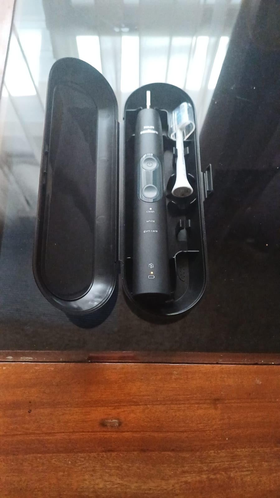 Philips Sonicare ProtectiveClean 5300 Rechargeable Electric Toothbrush, with Pressure Sensor, 3 Cleaning Modes, SmarTimer and QuadPacer, with 2 Bonus Brush Heads, Travel Case, Black, Model HX6423/34 customer photo 1