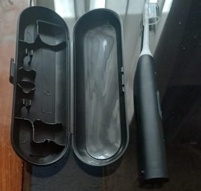 Philips Sonicare ProtectiveClean 5300 Rechargeable Electric Toothbrush, with Pressure Sensor, 3 Cleaning Modes, SmarTimer and QuadPacer, with 2 Bonus Brush Heads, Travel Case, Black, Model HX6423/34 customer photo 2