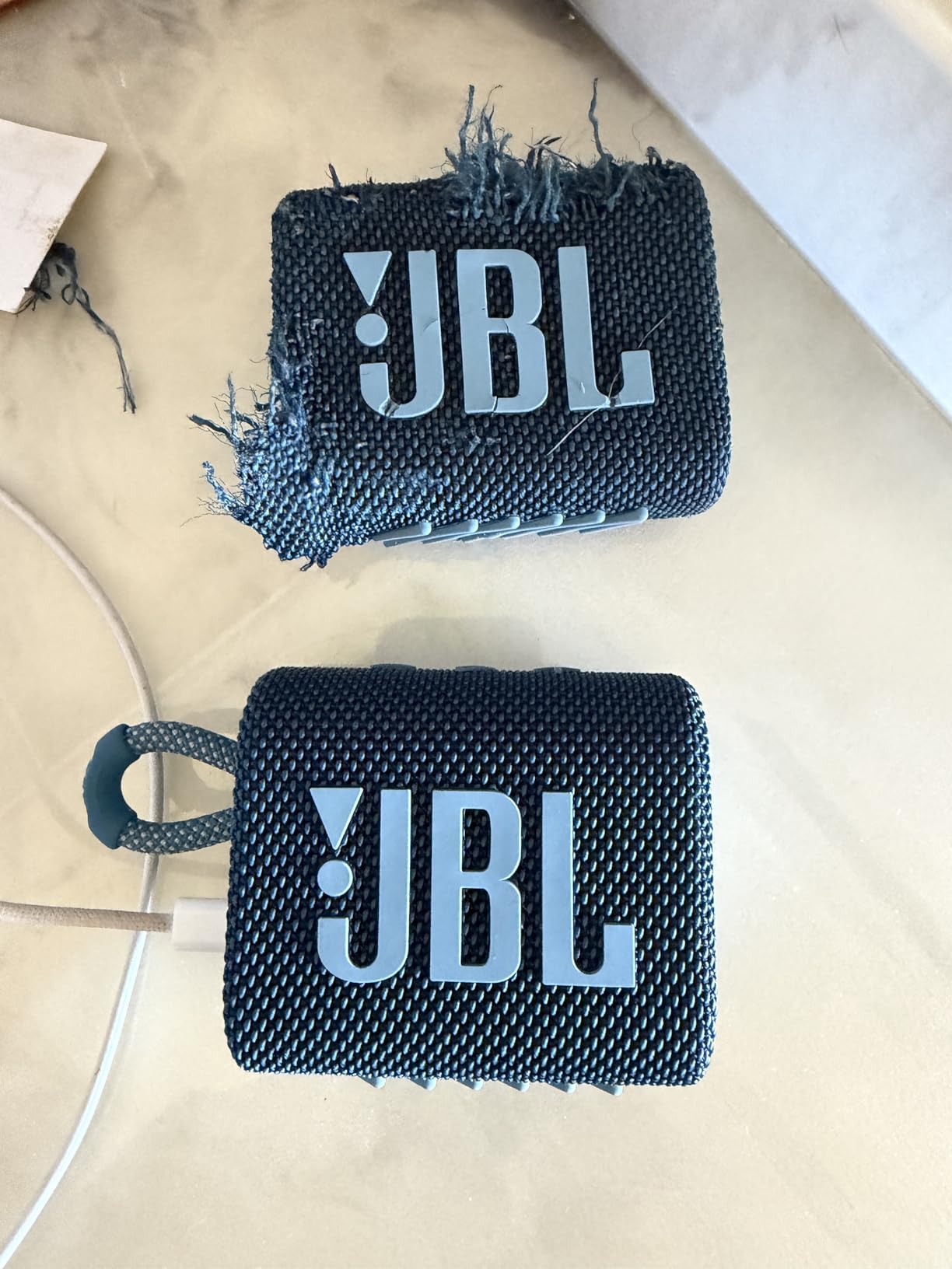 JBL Go 3 - Portable Mini Bluetooth Speaker, big audio and punchy bass, IP67 waterproof and dustproof, 5 hours of playtime, speaker for home, outdoor and travel (Black) customer photo 1