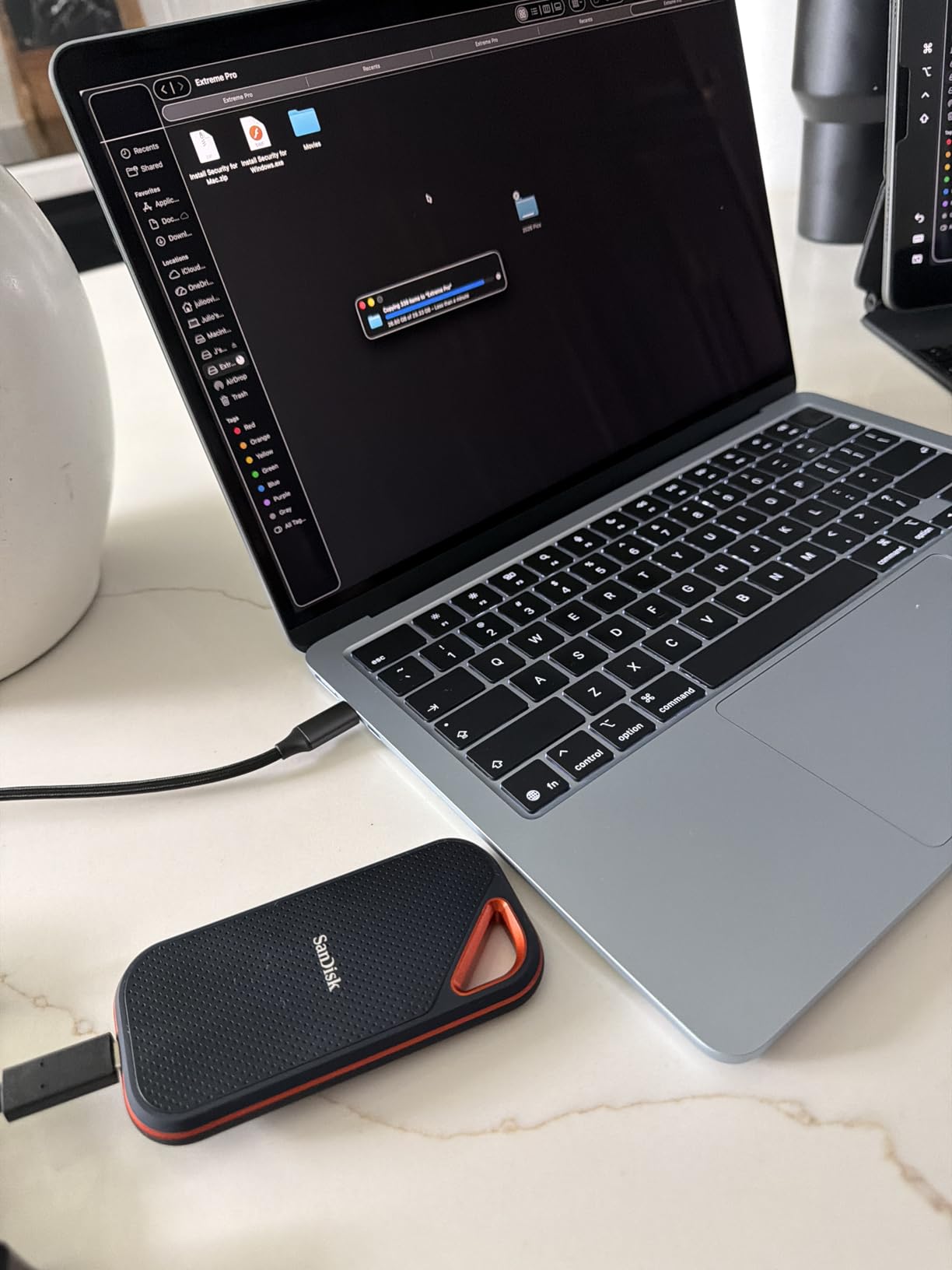 SANDISK 4TB Extreme PRO Portable SSD - Up to 2000MB/s - USB-C, USB 3.2 Gen 2x2, IP65 Water and Dust Resistance, Updated Firmware - External Solid State Drive - SDSSDE81-4T00-G25,Black | 2000MB/s NVMe performance with IP65 rating and AES encryption for storage, photography and travel customer photo 1