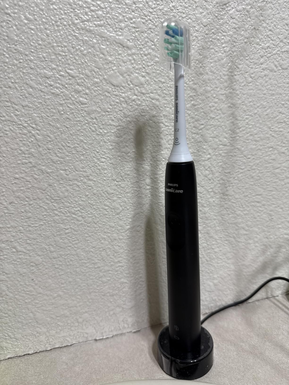 Philips Sonicare 4100 Rechargeable Electric Toothbrush, 1 Brush Head, Black | 700% More Plaque Removal, Pressure Sensor, 2 Brush Settings, 2-Minute Guided Timer, 14-Day Battery, HX3681/24 customer photo 2