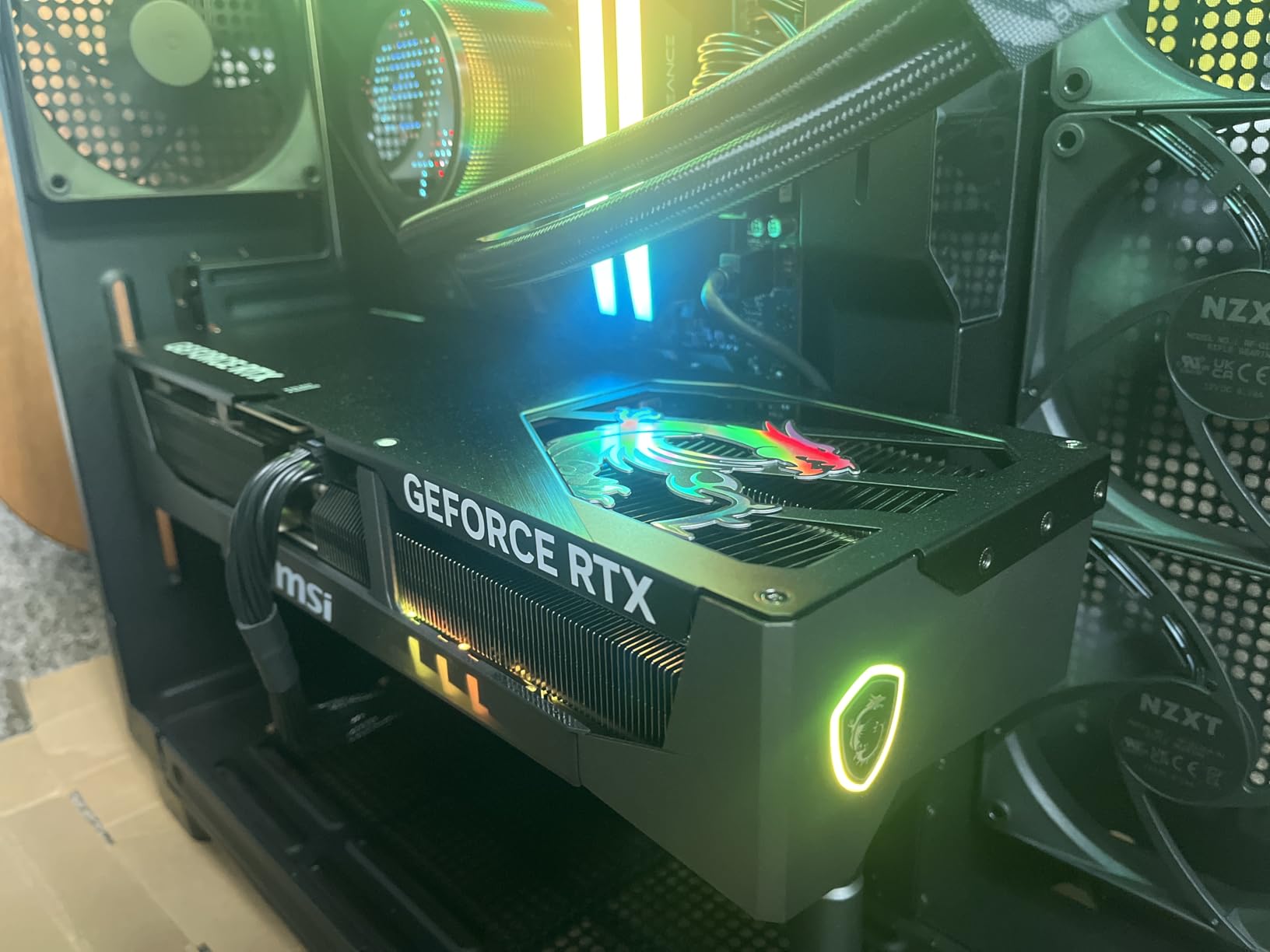 MSI GeForce RTX 5090 32G GAMING TRIO OC Graphics Card - RTX 5090 GPU, 32GB GDDR7 (28Gbps/512-bit), PCIe 5.0 - TRI FROZR 4 (3 x STORMFORCE Fan), Gaming & Silent mode - HDMI 2.1b, DisplayPort 2.1b customer photo 1
