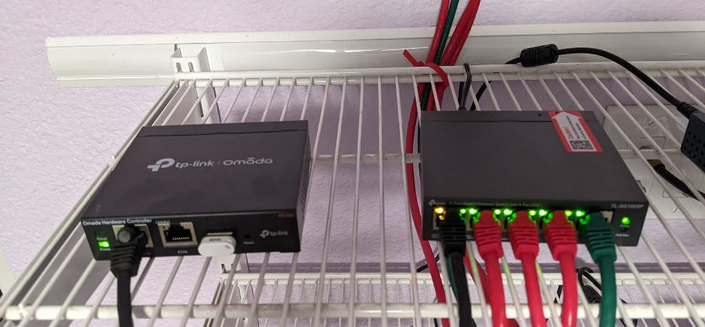 TP-Link 48 Port PoE Gigabit Switch(SG2452LP) | 32 PoE+ Ports, 16 Non-PoE Ports, 4 SFP Ports | 230W Budget | Omada Full Managed | Fanless | L2 Managed | VLAN, ZTP, LAG, PoE Recovery | 5-Year Warranty customer photo 2