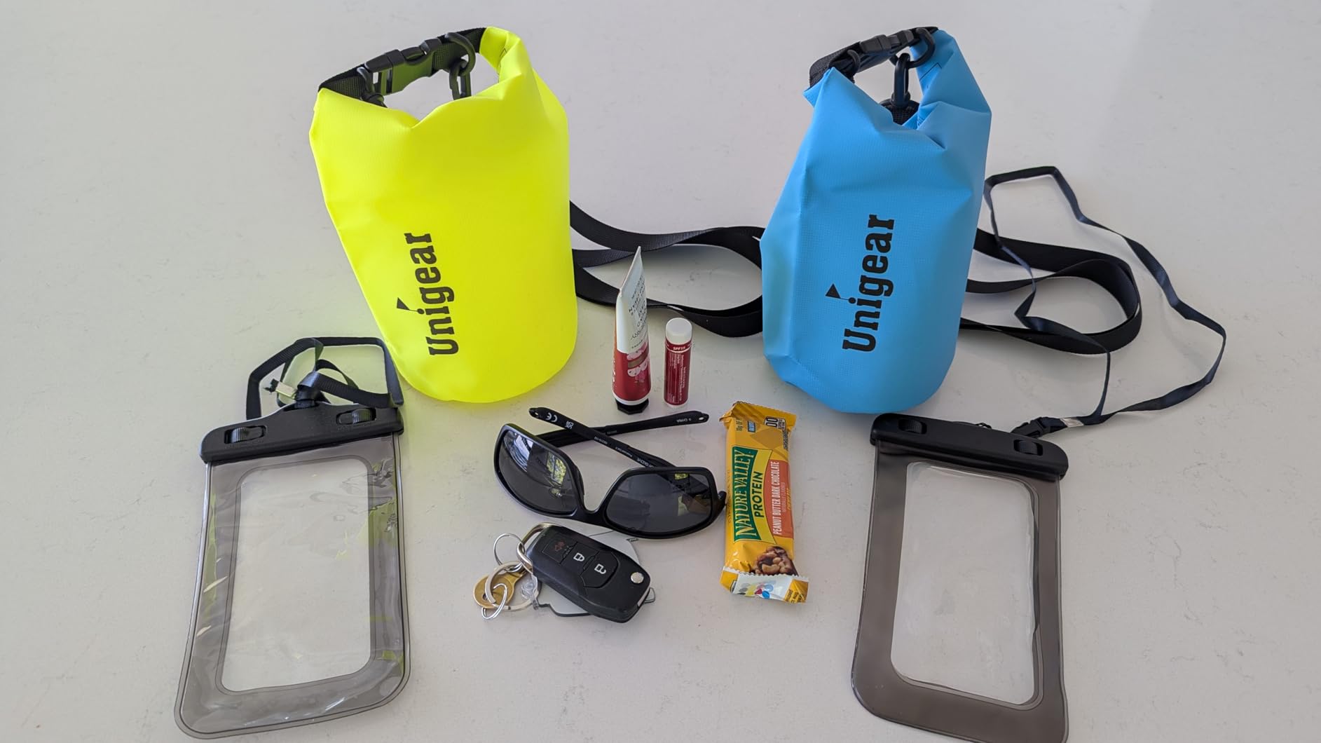 Unigear Floating Waterproof Dry Bag for Kayaking, 2L/5L/10L/20L/30L/40L | Lightweight Gear Storage, Waterproof Phone Case Included, For Boating, Fishing, Swimming, Camping, Beach And Paddle Boarding customer photo 1