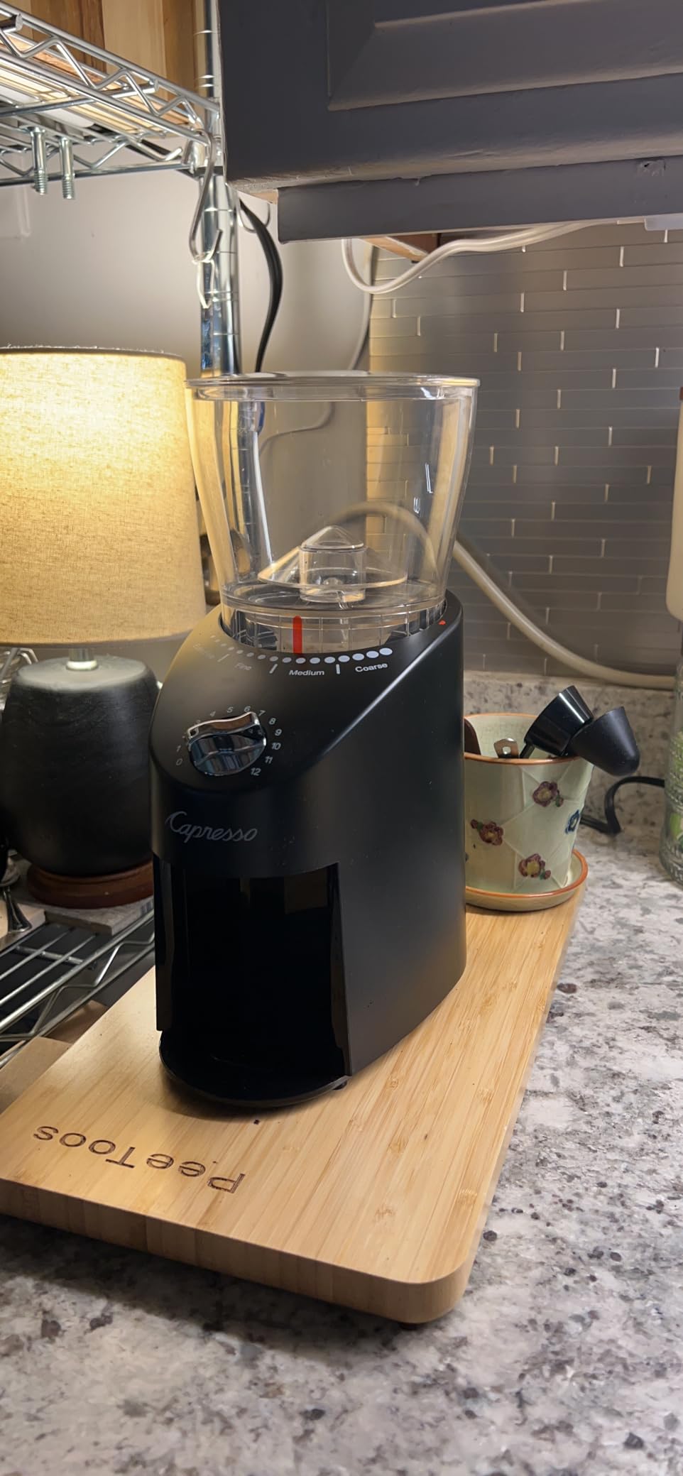 Capresso Infinity Plus Conical Burr Grinder, Black | Commercial-grade steel burrs, 16 settings, low-speed gear motor customer photo 1