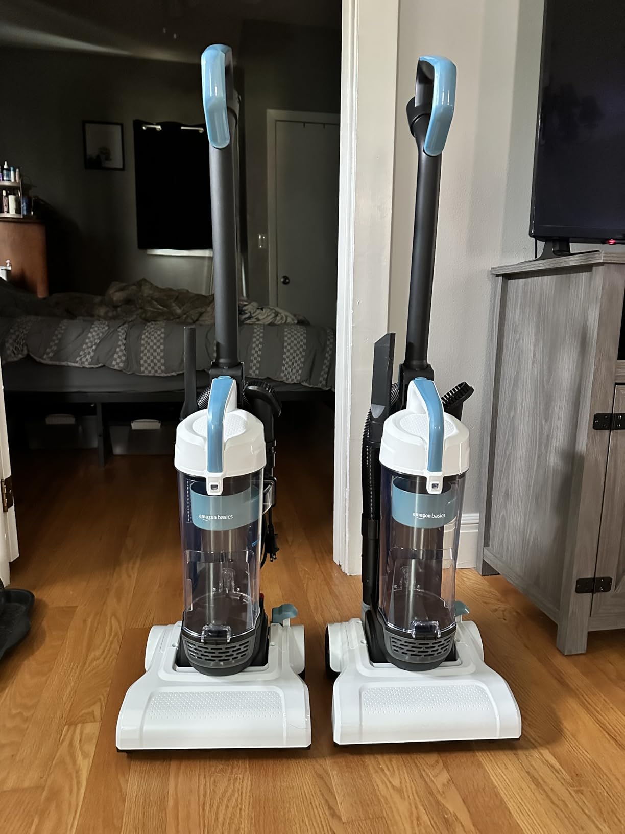 Amazon Basics Upright Bagless Vacuum Cleaner for Carpet and Hard Floors, Washable Filter, Crevice and Upholstery Tools, Detachable Handle, Lightweight, 1.7L Dust Cup, 25ft Cord, Black/White customer photo 2