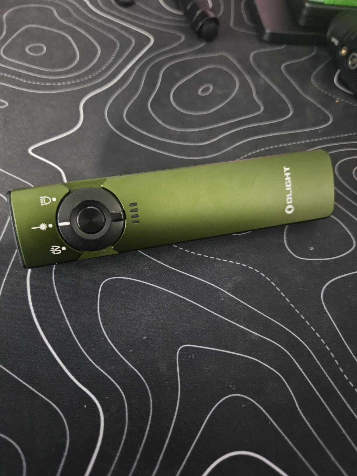 OLIGHT Arkfeld Pro Rechargeable EDC Flat Flashlight, Black CW, UV Light, Green Beam, White LED, 1300 Lumens, Portable Pocket Light, Magnetic Charging customer photo 1