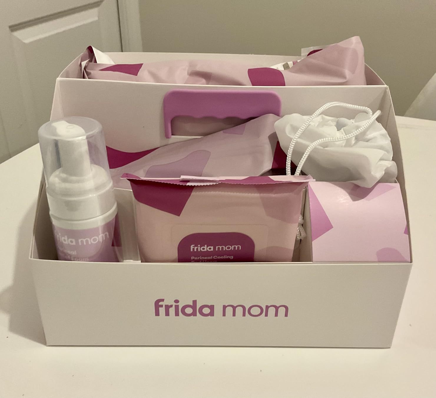 Frida Mom 11pc Postpartum Essentials Kit, Hospital Bag Basics for New Mom | Disposable Underwear, Ice Maxi Pads, Perineal Healing Foam, 24 Pad Liners & Peri Bottle for New Moms customer photo 1