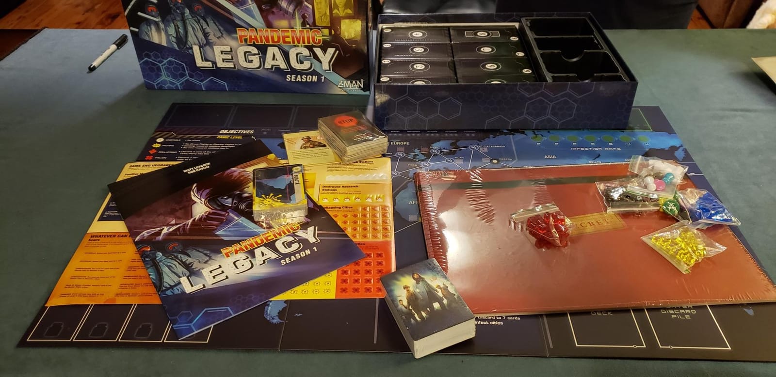 Pandemic Legacy Season 1 Board Game (Blue) - Epic Year-Long Battle Against Deadly Diseases! Cooperative Strategy Game for Family Game Night, Ages 13+, 2-4 Players, 1 Hr Playtime, Made by Z-Man Games customer photo 2