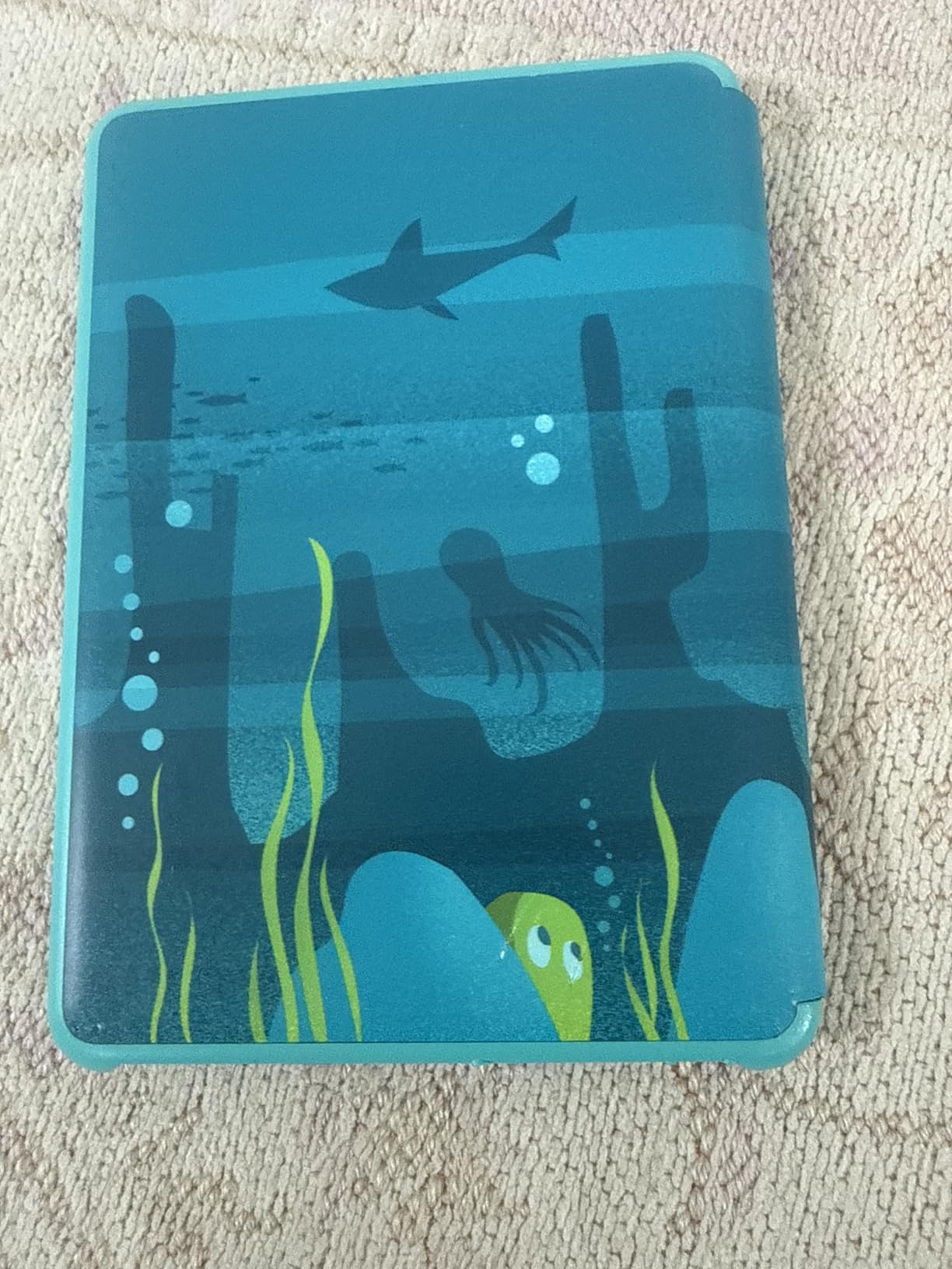 Kindle Kids 16GB (newest model) - If it breaks, we will replace it, includes ad-free books and cover, with glare-free display, faster page turns - Ocean Explorer customer photo 1