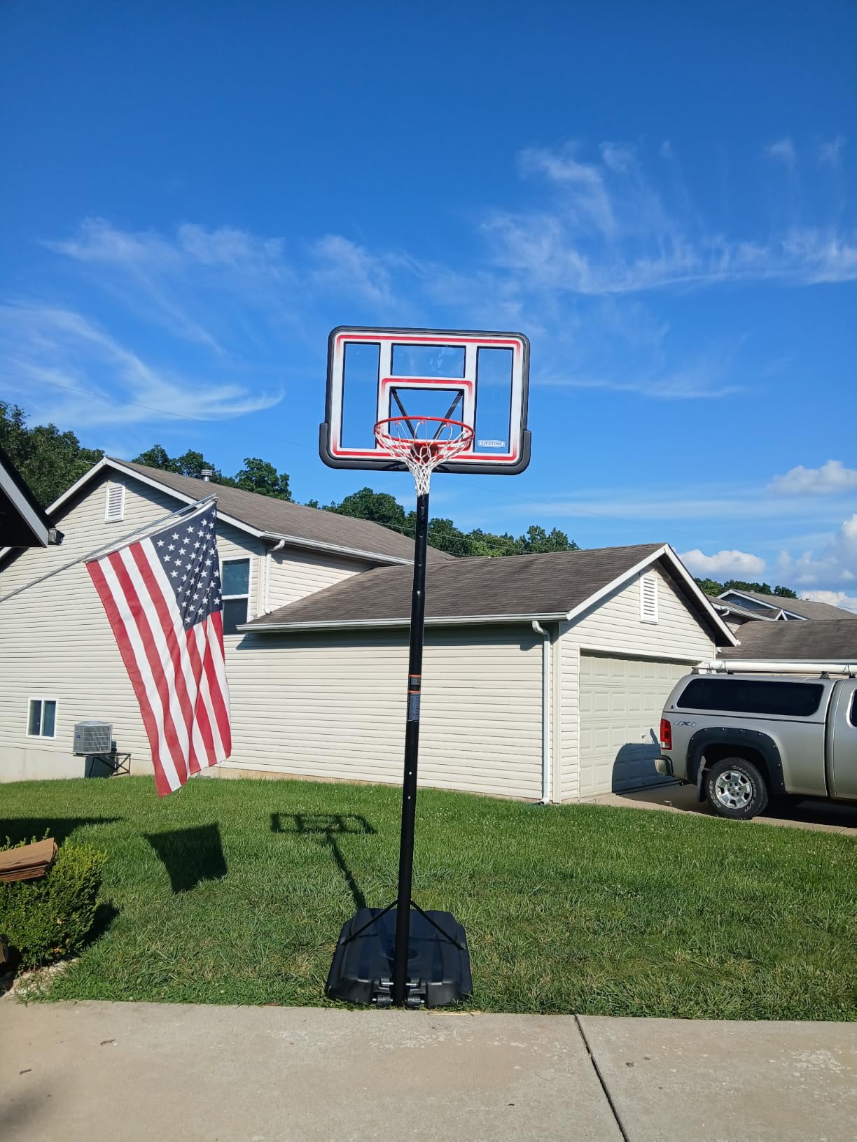 Lifetime NBA League Edition Portable Basketball Hoop, Adjustable Height 7.5-10 Ft, 44 Inch Shatterproof Polycarbonate Backboard, Steel Frame, Black/Clear customer photo 1